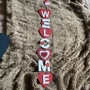 Welcome sign with hearts by Ashland
